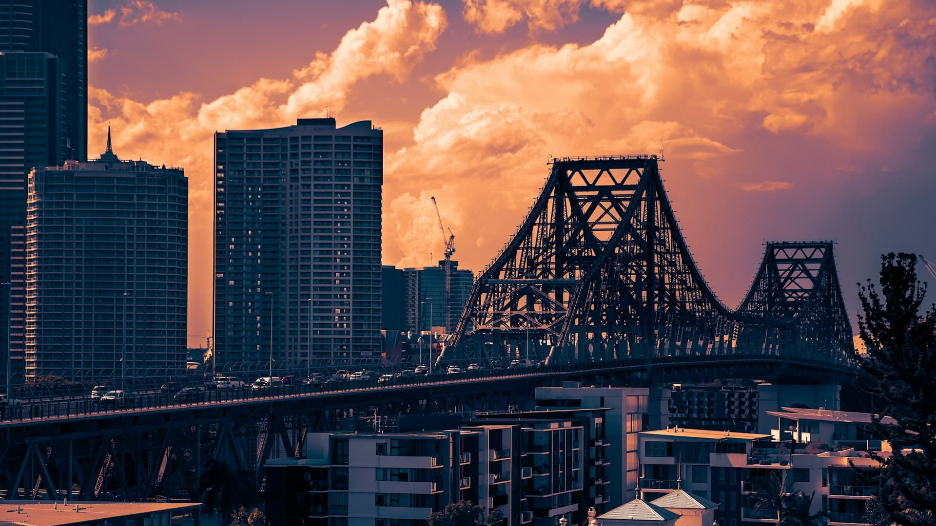 Property maintenance work across Brisbane — Story Bridge skyline